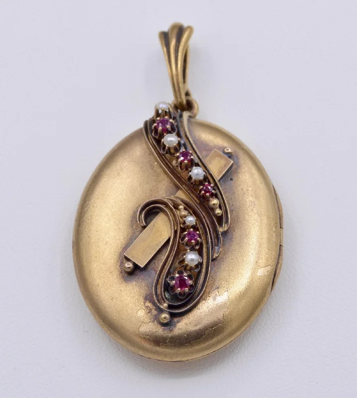 classic diamond necklaces for women -14K yellow gold locket with photo inside decorated with Rubies and seed pearls