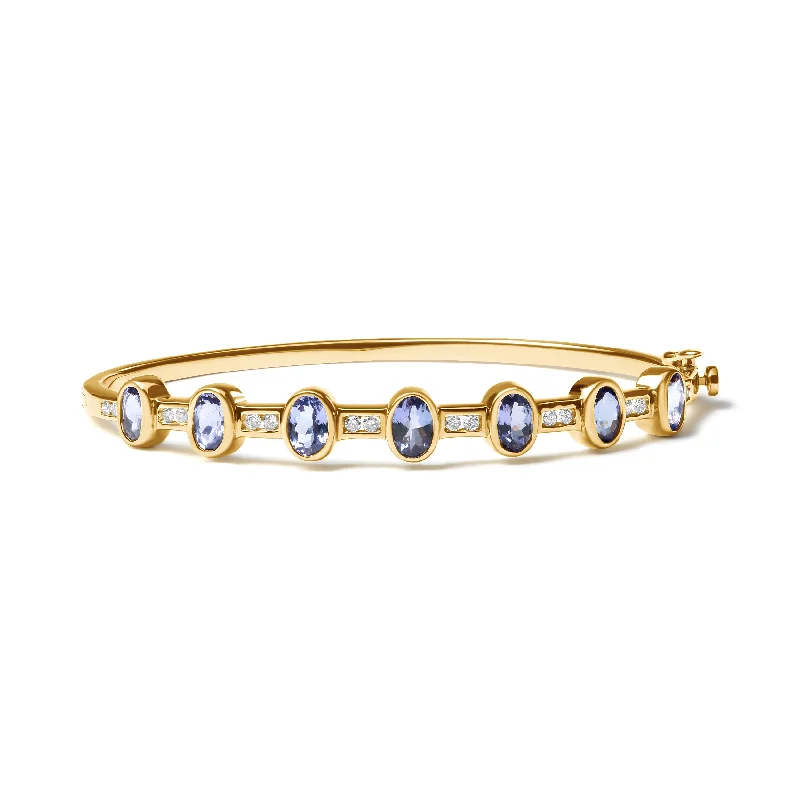 14K Yellow Gold 1/3 Cttw Round-Cut Diamond and 5MM Oval-Cut Blue Tanzanite Gemstone Bangle Bracelet