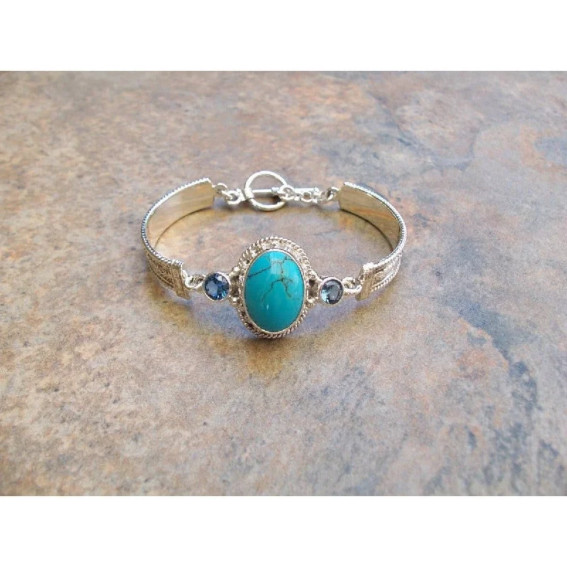 REVE Large Oval Turquoise  Hinged Sterling Silver and 14kt Bracelet with Blue Topaz