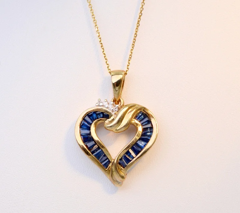 layered gold necklaces for women -10K yellow gold heart-shaped pendant with Blue Sapphires and small Diamonds for the sparkle