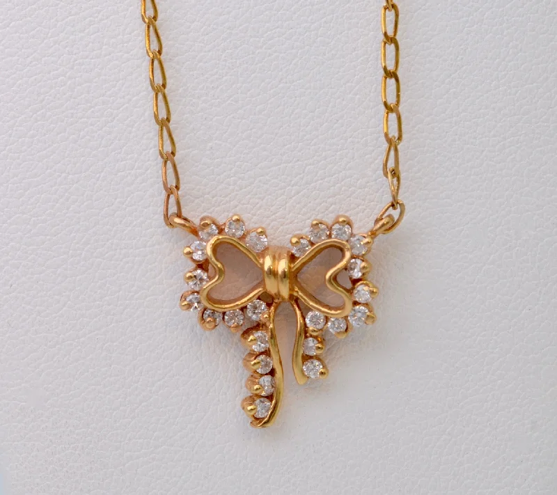 silver chain necklaces for women -Diamond-studded Bow-Shaped Necklace in 14K Yellow Gold