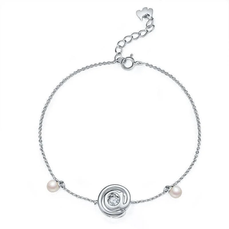 @ Symbol Dancing Diamond with Fresh Water Pearls Bracelet